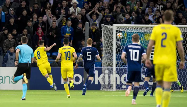 Yuriy Pertsukh lashes in the first goal for Kazakhstan