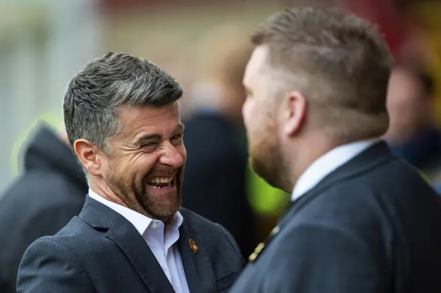 Motherwell manager Stephen Robinson and chief executive Alan Burrows