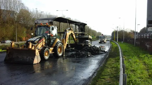 Diggers removing lorry