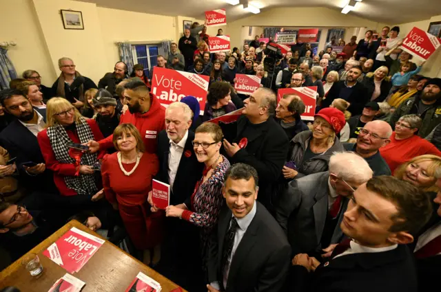 Opposition Labour party leader Jeremy Corbyn joins supporters after speaking at an election campaign event in Dudley, West Midlands