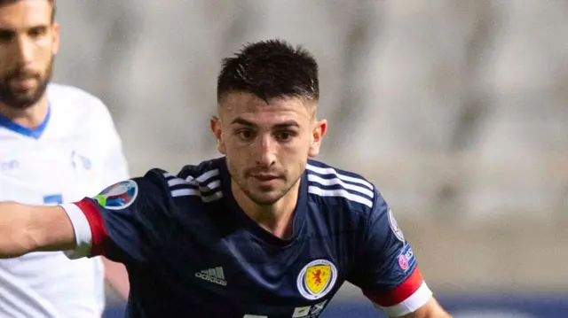 Greg Taylor playing for Scotland against Cyprus