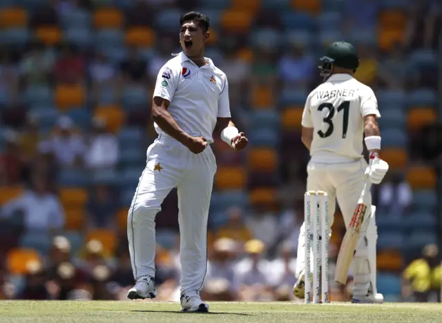 Naseem Shah of Pakistan celebrates after taking his first test wicket, the wicket of David Warner of Australia during day three of the 1st Domain Test between Australia and Pakistan at The Gabba