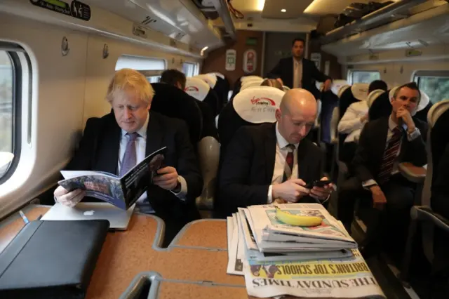 Boris Johnson on a train