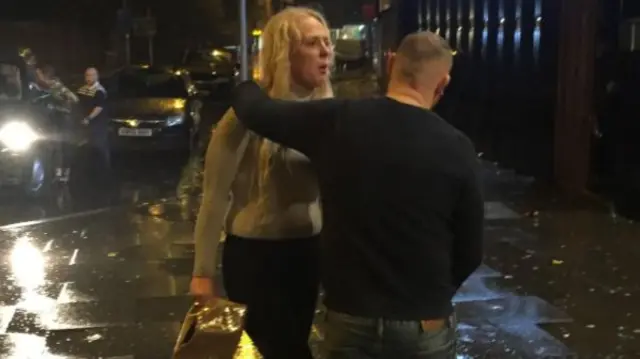 Woman outside nightclub