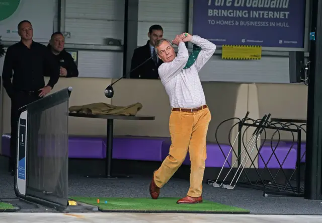 Brexit Party leader Nigel Farage playing golf on a range at One Stop Golf in Hull, East Yorkshire, whist on the General Election campaign trail