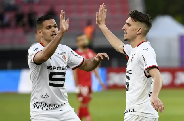 Rennes' Adrien Hunou (right) celebrates scoring against Dijon