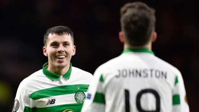 Celtic's Lewis Morgan celebrates with fellow scorer Mikey Johnston