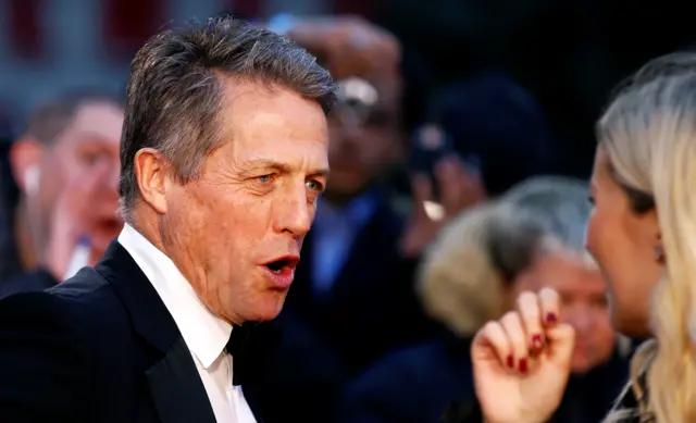 Actor Hugh Grant arrives for the screening of "The Irishman" during the 2019 BFI London Film Festival at the Odeon Luxe Leicester Square in London