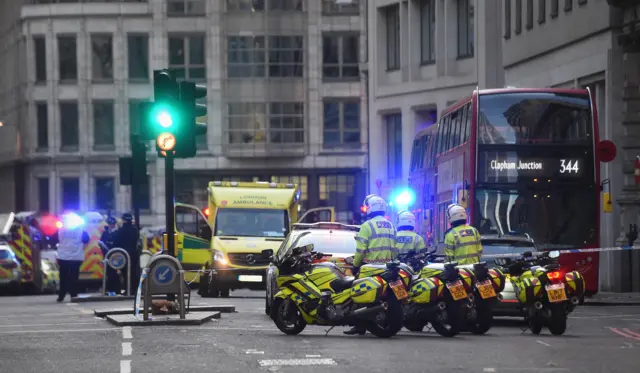 Police on Gracechurch Street in London near the scene of an incident on London Bridge in central London.