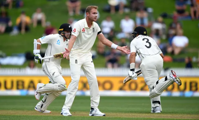 Stuart Broad of England reacts as Tom Latham and Ross Taylor of New Zealand score runs during day 1 of the second Test match between New Zealand and England at Seddon Park