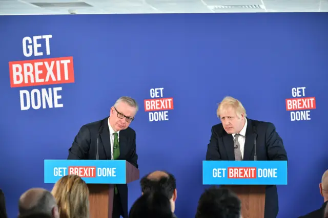 Prime Minister Boris Johnson and Chancellor of the Duchy of Lancaster, Michael Gove (left) speaking at a press conference in Millbank Tower, London