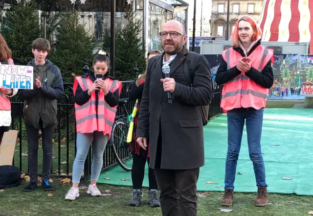 Scottish Greens co-leader Patrick Harvie speaking at a climate strike in Glasgow"s George Square. PA Photo. Picture date: Friday November 29, 2019. Harvie has said any word that comes out of Boris Johnson"s mouth cannot be trusted, after the Prime Minister avoided a leader"s debate on climate