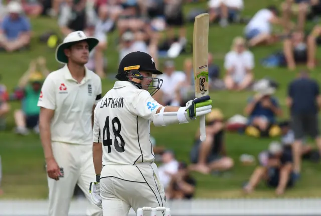 Tom Latham celebrates his half century