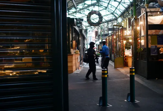 Armed officer in Borough Market