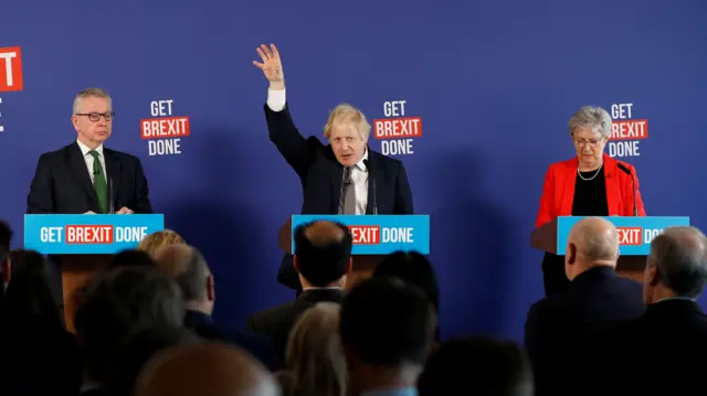 Britain"s Prime Minister Boris Johnson speaks at a news conference along with Chancellor of the Duchy of Lancaster Michael Gove and former Labour MP Gisela Stuart