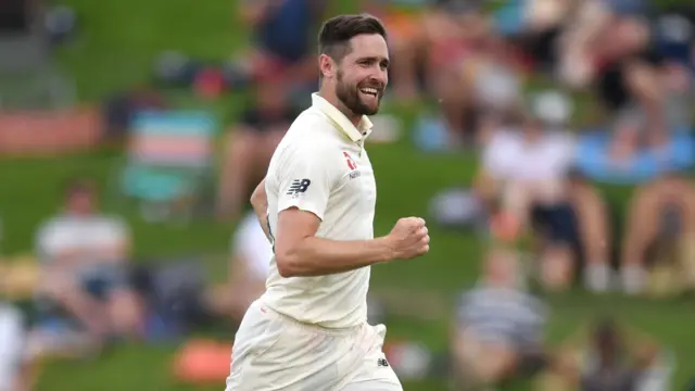Chris Woakes of England celebrates dismissing Ross Taylor of New Zealand during day 1 of the second Test match between New Zealand and England at Seddon Park
