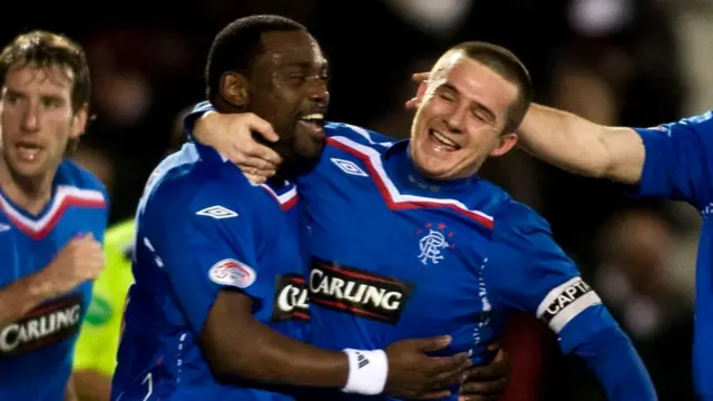 Jean-Claude Darcheville and Barry Ferguson celebrate