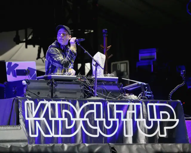 DJ KidCutUp performs at the Circuit of the Americas after the qualifying session