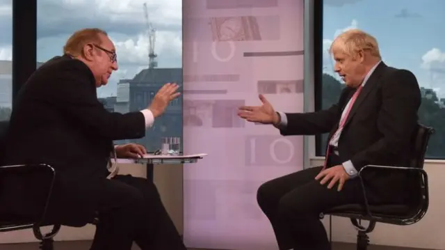 Andrew Neil and Boris Johnson