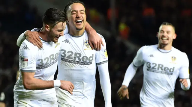 Jack Harrison, Hedler Costa and Kalvin Phillips celebrate a goal for Leeds United