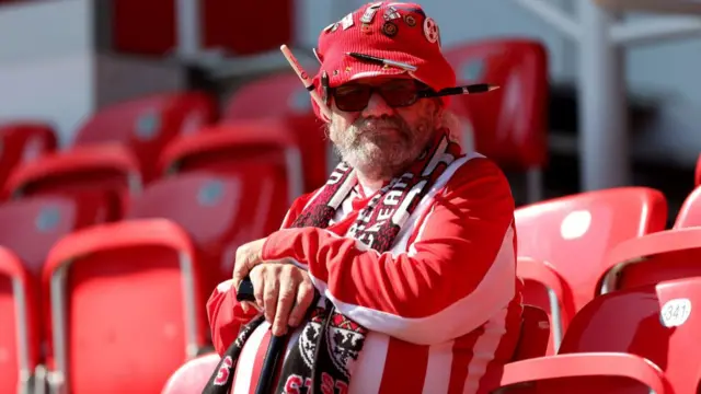 A fan of Stoke City looks on prior to a game this season