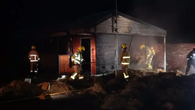 Firefighters fighting fire