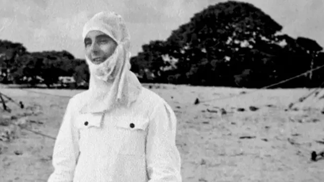 John Ward, in government-issued protective clothing, was on Christmas Island from 1957 to 1958