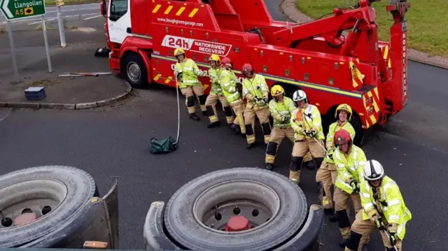 Fire fighters at work to free the cattle