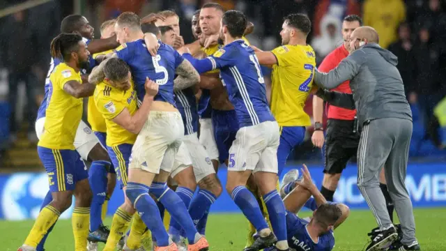 Birmingham City and Cardiff City players clashing