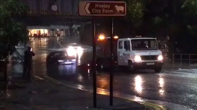 A car being pulled from the water