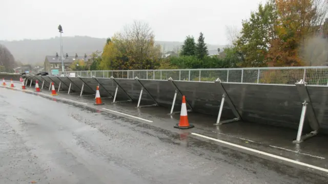 Temporary flood barriers in place in Mytholmroyd