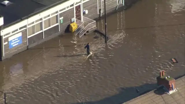 A person in waders at Bentley Ambulance Centre