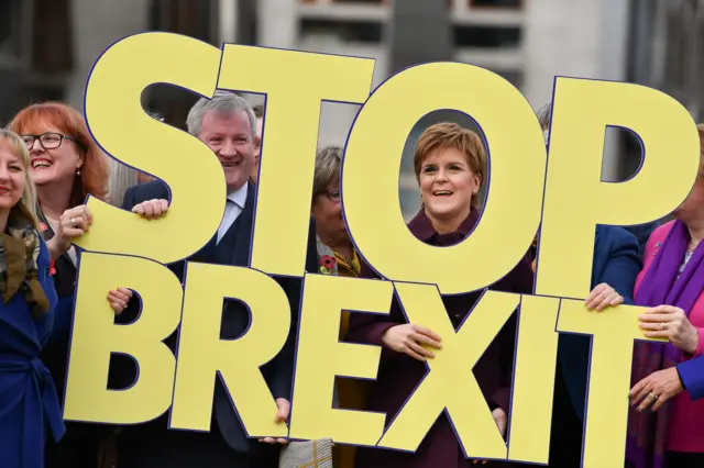 Nicola Sturgeon with a 'Stop Brexit' sign