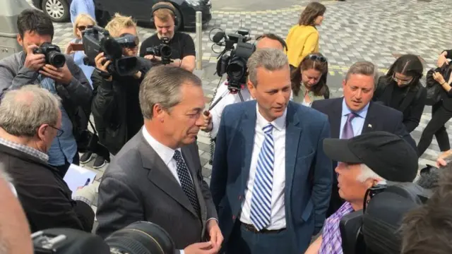 Nigel Farage and MEP Nathan Gill meeting voters in Merthyr Tydfil ahead of May's European elections