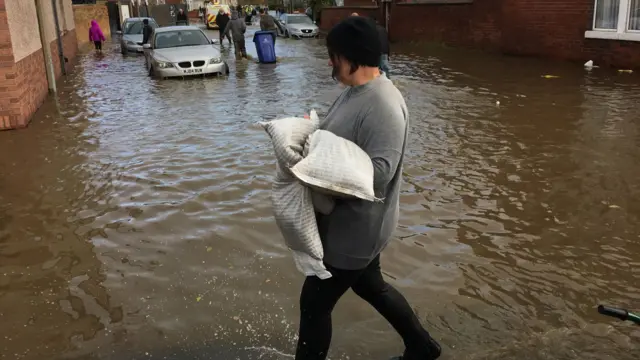 A person with sandbags