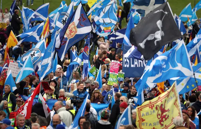 Independence supporters march through Edinburgh during an All Under One Banner march in Oct 2019