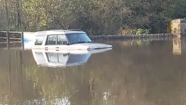 Car in flood water