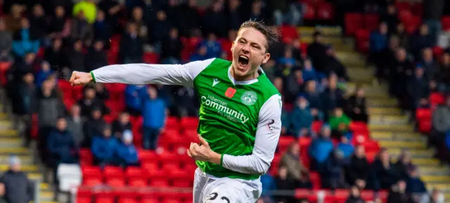 Scott Allan celebrates making it 3-0 to Hibs in Perth