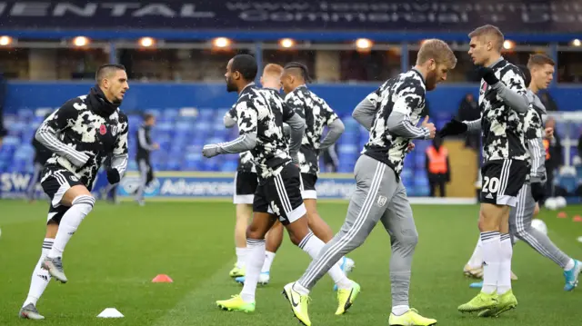 Fulham warm up