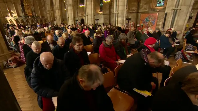 The congregation reflects during the service at Southwark Cathedral