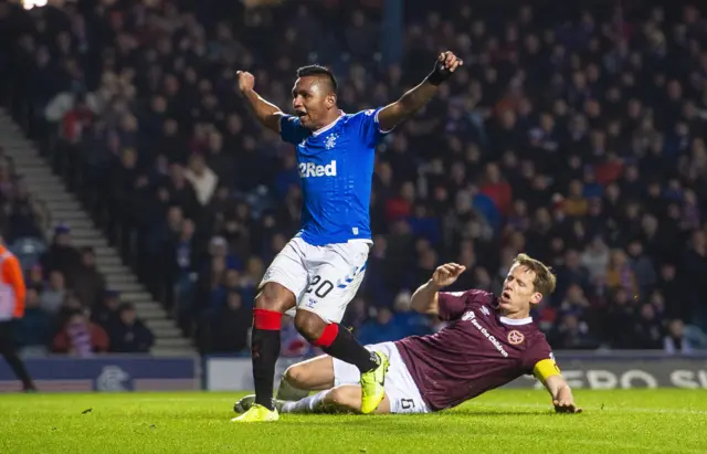 Christophe Berra watches his attempted interception fly into his own net.