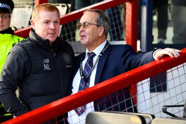 Neil Lennon in conversation with Ross County chairman Roy MacGregor