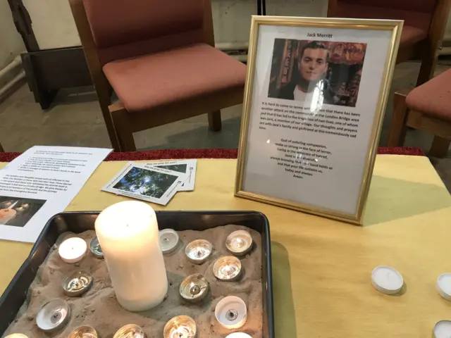 Candle and tribute at All Saint’s Church, Cottenham