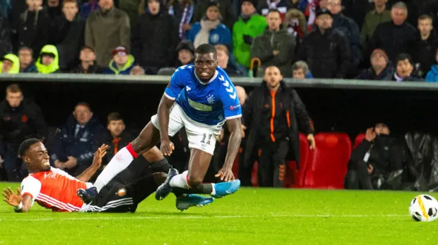 Rangers' Sheyi Ojo is brought down against Feyenoord