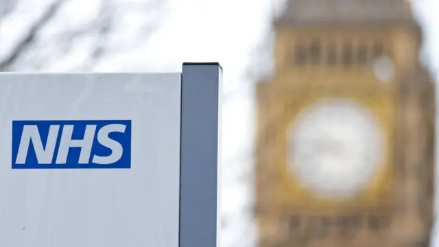 NHS sign with Big Ben in background