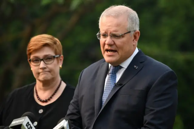 Australian PM Scott Morrison and Foreign Minister Marise Payne speak at a press conference on Tuesday