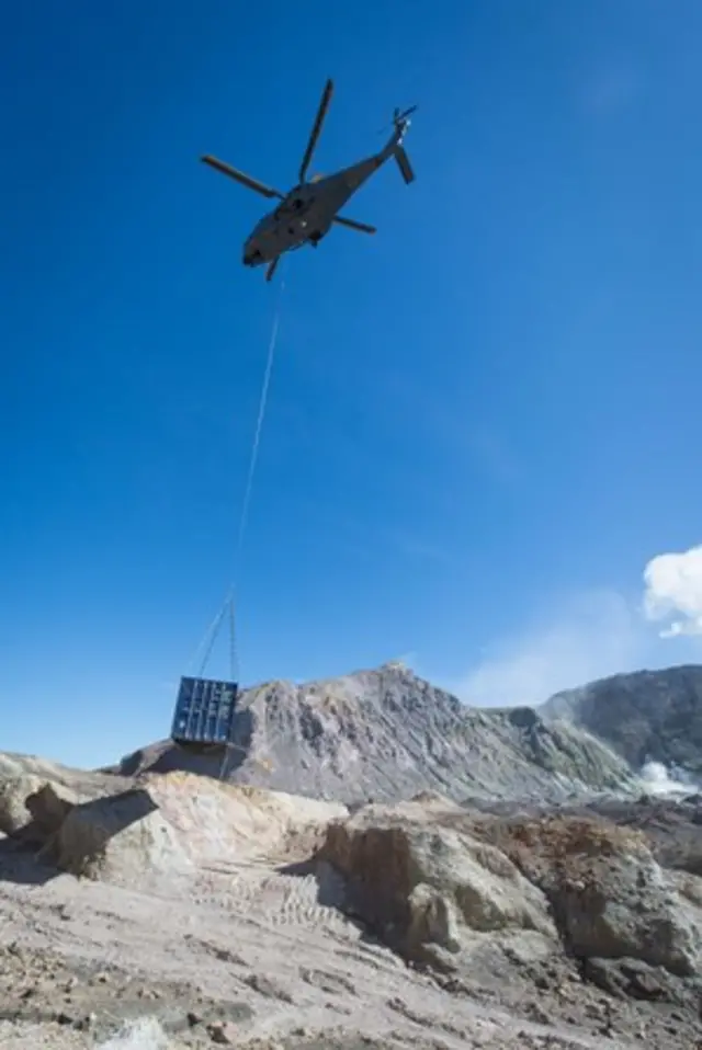 The container being lowered onto White Island in 2016