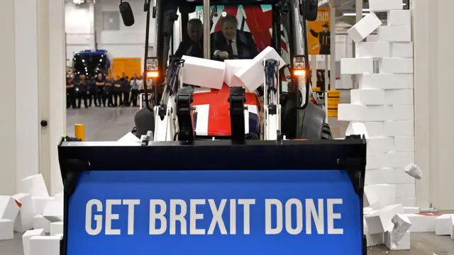 Boris Johnson on a JCB