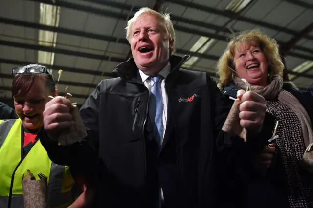 Boris Johnson pulls Christmas cracker