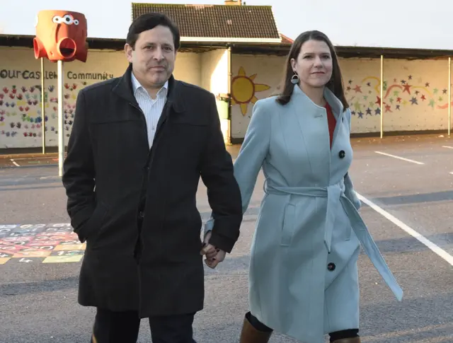 Jo Swinson and her husband Duncan Hames outside a polling station.